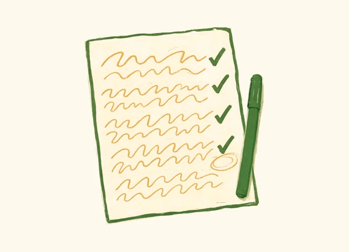 A page of handwritten working with green ticks beside the correct steps and one step circled, next to a marker pen